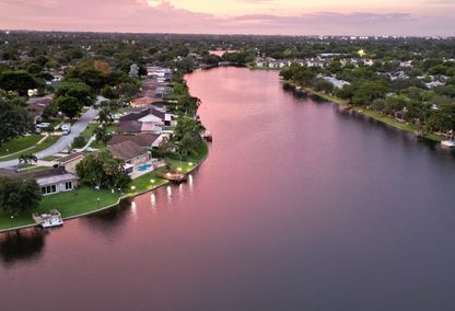 Pink sunset over waterfront neighborhood in Tampa, FL