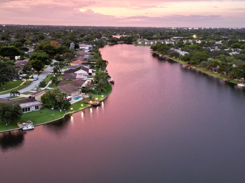 Pink sunset over waterfront neighborhood in Tampa, FL